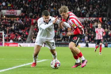 Joel Latibeaudiere #22 of Swansea City battles Jack Clarke #20 of Sunderland during the Sky Bet Championship match Sunderland vs Swansea City at Stadium Of Light, Sunderland, United Kingdom, 14th January 202