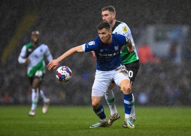 Ipswich Town midfielder Lee Evans  (8) shields the ball from Plymouth Argyle midfielder Danny Mayor  (10)  during the Sky Bet League 1 match Ipswich Town vs Plymouth Argyle at Portman Road, Ipswich, United Kingdom, 14th January 202