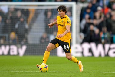 Hugo Bueno #64 of Wolverhampton Wanderers with the ball during the Premier League match Wolverhampton Wanderers vs West Ham United at Molineux, Wolverhampton, United Kingdom, 14th January 202