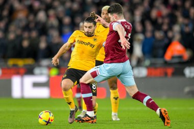 Declan Rice #41 of West Ham United challenges Ruben Neves #8 of Wolverhampton Wanderers during the Premier League match Wolverhampton Wanderers vs West Ham United at Molineux, Wolverhampton, United Kingdom, 14th January 202