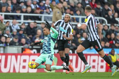 Kenny Tete #2 of Fulham goes down under a challenge from Joelinton #7 of Newcastle United during the Premier League match Newcastle United vs Fulham at St. James's Park, Newcastle, United Kingdom, 15th January 202