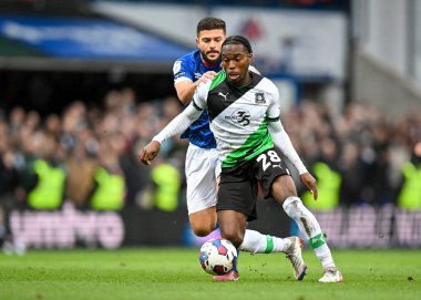 Plymouth Argyle midfielder Jay Matete (28)  attacking and goes past Ipswich Town midfielder Sam Morsy  (5)  during the Sky Bet League 1 match Ipswich Town vs Plymouth Argyle at Portman Road, Ipswich, United Kingdom, 14th January 202