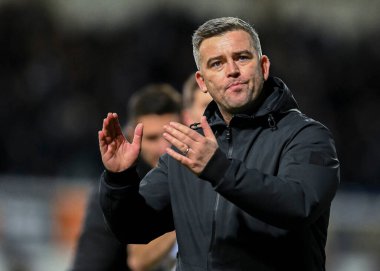 Plymouth Argyle Manager Steven Schumacher  applauds the fans at full time  during the Sky Bet League 1 match Ipswich Town vs Plymouth Argyle at Portman Road, Ipswich, United Kingdom, 14th January 202