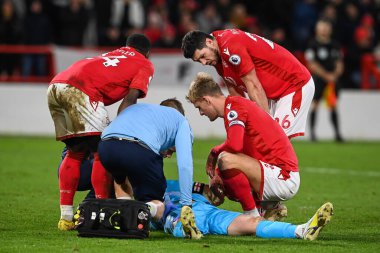 Dean Henderson #1 of Nottingham Forest goes down with a injury during the Premier League match Nottingham Forest vs Leicester City at City Ground, Nottingham, United Kingdom, 14th January 202 clipart