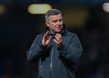Plymouth Argyle Manager Steven Schumacher  applauds the fans at full time  during the Sky Bet League 1 match Ipswich Town vs Plymouth Argyle at Portman Road, Ipswich, United Kingdom, 14th January 202