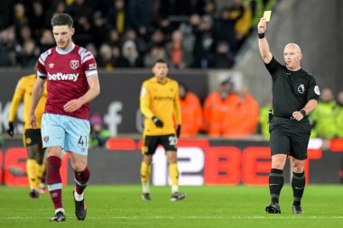 Declan Rice #41 of West Ham United receives a yellow card  from referee Simon Hooper during the Premier League match Wolverhampton Wanderers vs West Ham United at Molineux, Wolverhampton, United Kingdom, 14th January 202