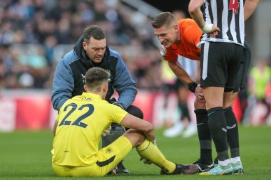 Referee Robert Jones checks on Nick Pope #22 of Newcastle United during the Premier League match Newcastle United vs Fulham at St. James's Park, Newcastle, United Kingdom, 15th January 202