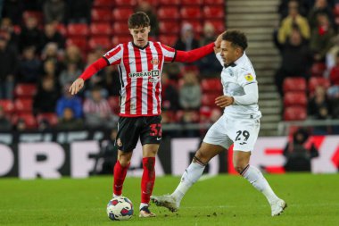 Matthew Sorinola #29 of Swansea City tackles Trai Hume #32 of Sunderland during the Sky Bet Championship match Sunderland vs Swansea City at Stadium Of Light, Sunderland, United Kingdom, 14th January 202