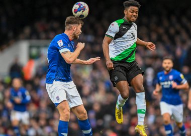 Plymouth Argyle forward Niall Ennis  (11) battles in the air  during the Sky Bet League 1 match Ipswich Town vs Plymouth Argyle at Portman Road, Ipswich, United Kingdom, 14th January 202