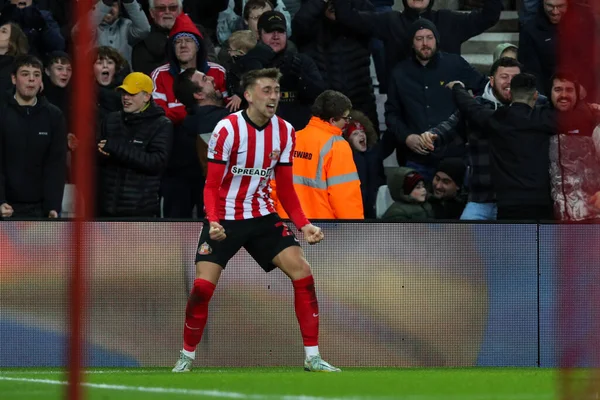Dan Neil #24 of Sunderland Celebrates scoring 1-1 during the Sky Bet Championship match Sunderland vs Swansea City at Stadium Of Light, Sunderland, United Kingdom, 14th January 202