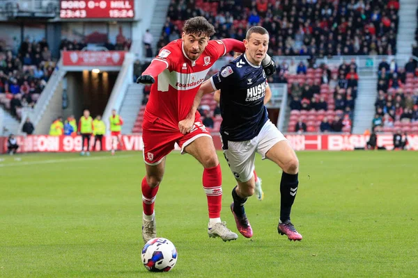 Matt Crooks #25 of Middlesbrough takes on Murray Wallace #3 of Millwall during the Sky Bet Championship match Middlesbrough vs Millwall at Riverside Stadium, Middlesbrough, United Kingdom, 14th January 202