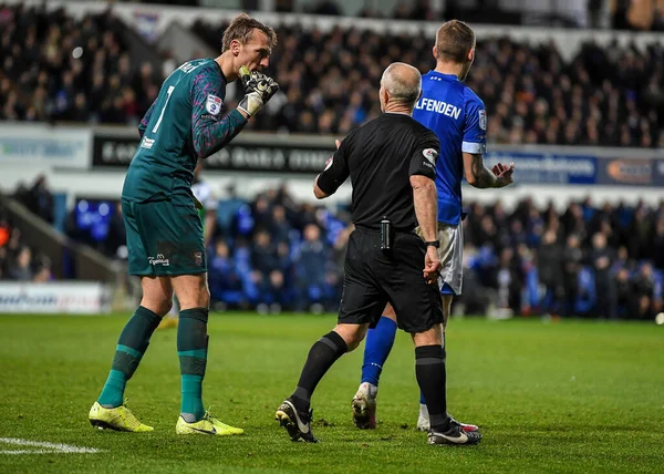 Ipswich Town goalkeeper Christian Walton  (1) appeals to official Referee ANDY WOOLMER   during the Sky Bet League 1 match Ipswich Town vs Plymouth Argyle at Portman Road, Ipswich, United Kingdom, 14th January 202