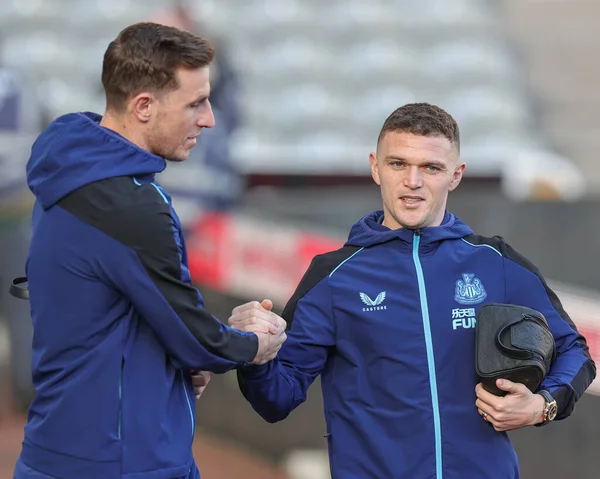 Chris Wood #20 of Newcastle United and Kieran Trippier #2 of Newcastle United shake hands as they arrive ahead of the Premier League match Newcastle United vs Fulham at St. James's Park, Newcastle, United Kingdom, 15th January 202