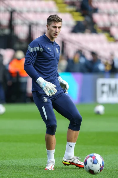 Stuart Moore #13 of Blackpool warms up during the Sky Bet Championship match Watford vs Blackpool at Vicarage Road, Watford, United Kingdom, 14th January 202