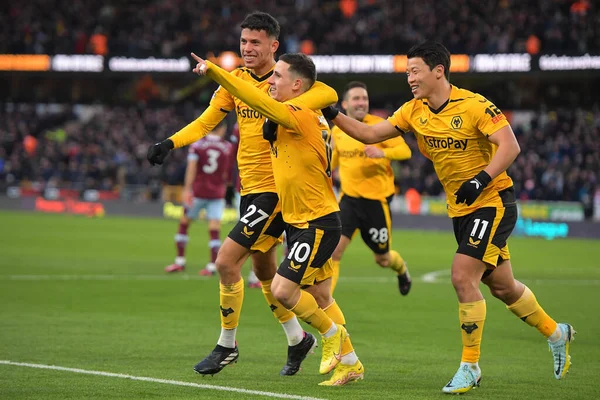 Daniel Podence #10 of Wolverhampton Wanderers celebrates his goal with Matheus Nunes #27 of Wolverhampton Wanderers Hwang Hee-Chan #11 of Wolverhampton Wanderers during the Premier League match Wolverhampton Wanderers vs West Ham United at Molineux, 