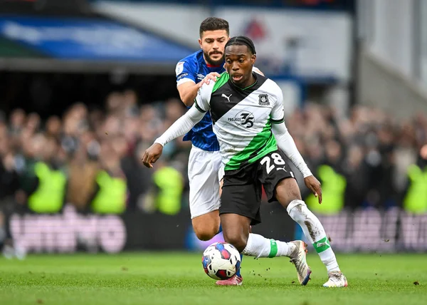Plymouth Argyle midfielder Jay Matete (28)  attacking and goes past Ipswich Town midfielder Sam Morsy  (5)  during the Sky Bet League 1 match Ipswich Town vs Plymouth Argyle at Portman Road, Ipswich, United Kingdom, 14th January 202