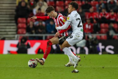 Matthew Sorinola #29 of Swansea City tackles Trai Hume #32 of Sunderland during the Sky Bet Championship match Sunderland vs Swansea City at Stadium Of Light, Sunderland, United Kingdom, 14th January 202