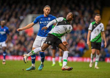 Plymouth Argyle midfielder Jay Matete (28)  battles for possession  during the Sky Bet League 1 match Ipswich Town vs Plymouth Argyle at Portman Road, Ipswich, United Kingdom, 14th January 202