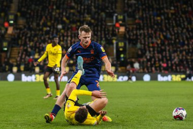 Callum Connolly #2 of Blackpool fouls Joao Ferreira #13 of Watford during the Sky Bet Championship match Watford vs Blackpool at Vicarage Road, Watford, United Kingdom, 14th January 202
