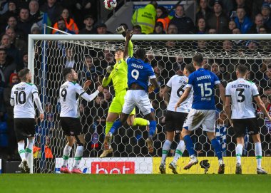Plymouth Argyle goalkeeper Michael Cooper  (1) punches the ball away before Ipswich Town forward Freddie Ladapo  (9)  during the Sky Bet League 1 match Ipswich Town vs Plymouth Argyle at Portman Road, Ipswich, United Kingdom, 14th January 202