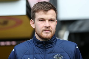 Jordan Thorniley #34 of Blackpool arrives at the stadium during the Sky Bet Championship match Watford vs Blackpool at Vicarage Road, Watford, United Kingdom, 14th January 202