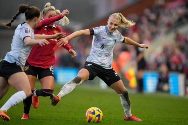 Emma Koivisto #2 of Liverpool Women stretches for the ball under pressure from Adrianna Leon #19 of Manchester Unitedduring the The Fa Women's Super League match Manchester United Women vs Liverpool Women at Leigh Sports Village, Leigh, United Kingdo