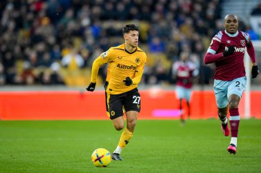 Matheus Nunes #27 of Wolverhampton Wanderers makes a run with the ball chased by Angelo Ogbonna #21 of West Ham United during the Premier League match Wolverhampton Wanderers vs West Ham United at Molineux, Wolverhampton, United Kingdom, 14th January clipart