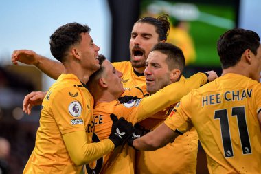 Daniel Podence #10 of Wolverhampton Wanderers celebrates his goal with his team mates Hwang Hee-Chan #11 of Wolverhampton Wanderers during the Premier League match Wolverhampton Wanderers vs West Ham United at Molineux, Wolverhampton, United Kingdom,