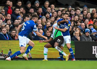 Ipswich Town midfielder Sam Morsy  (5) commits a foul on Plymouth Argyle forward Niall Ennis  (11)  during the Sky Bet League 1 match Ipswich Town vs Plymouth Argyle at Portman Road, Ipswich, United Kingdom, 14th January 202