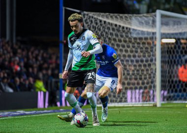 Plymouth Argyle midfielder Tyreik Wright (29) shields the ball fro Ipswich Town midfielder Lee Evans  (8)  during the Sky Bet League 1 match Ipswich Town vs Plymouth Argyle at Portman Road, Ipswich, United Kingdom, 14th January 202