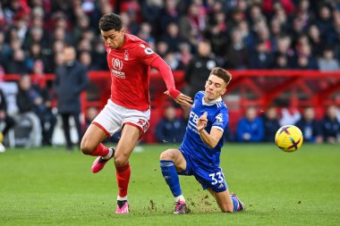 Brennan Johnson #20 of Nottingham Forest is tackled by Luke Thomas #33 of Leicester City during the Premier League match Nottingham Forest vs Leicester City at City Ground, Nottingham, United Kingdom, 14th January 202