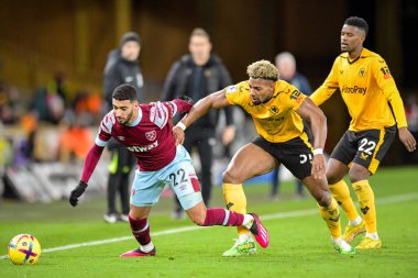 Adama Traore #37 of Wolverhampton Wanderers battles for the ball with Said Benrahma #22 of West Ham United during the Premier League match Wolverhampton Wanderers vs West Ham United at Molineux, Wolverhampton, United Kingdom, 14th January 202 clipart