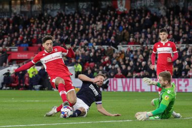 Shaun Hutchinson #4 of Millwall puts in a last ditch challenge on Matt Crooks #25 of Middlesbrough during the Sky Bet Championship match Middlesbrough vs Millwall at Riverside Stadium, Middlesbrough, United Kingdom, 14th January 202
