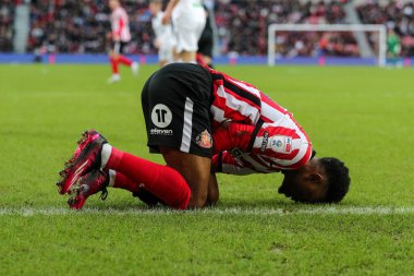 Amad Diallo #16 of Sunderland down injured after a battle with Liam Cullen #20 of Swansea City during the Sky Bet Championship match Sunderland vs Swansea City at Stadium Of Light, Sunderland, United Kingdom, 14th January 202