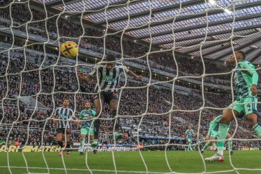 Alexander Isak #14 of Newcastle United scores a goal to make it 1-0 during the Premier League match Newcastle United vs Fulham at St. James's Park, Newcastle, United Kingdom, 15th January 2023 clipart