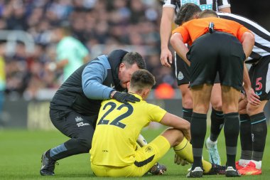 Nick Pope #22 of Newcastle United receives medical treatment during the Premier League match Newcastle United vs Fulham at St. James's Park, Newcastle, United Kingdom, 15th January 202