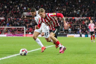 Joel Latibeaudiere #22 of Swansea City battles Jack Clarke #20 of Sunderland during the Sky Bet Championship match Sunderland vs Swansea City at Stadium Of Light, Sunderland, United Kingdom, 14th January 202