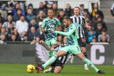 Kieran Trippier #2 of Newcastle United tackles Layvin Kurzawa #3 of Fulham during the Premier League match Newcastle United vs Fulham at St. James's Park, Newcastle, United Kingdom, 15th January 202