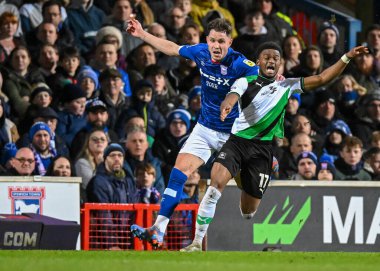 Ipswich Town forward George Hirst  (27) commits a foul on Plymouth Argyle full back Bali Mumba  (17)   during the Sky Bet League 1 match Ipswich Town vs Plymouth Argyle at Portman Road, Ipswich, United Kingdom, 14th January 202