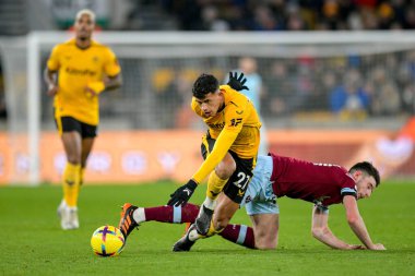 Matheus Nunes #27 of Wolverhampton Wanderers challenges Declan Rice #41 of West Ham United during the Premier League match Wolverhampton Wanderers vs West Ham United at Molineux, Wolverhampton, United Kingdom, 14th January 202