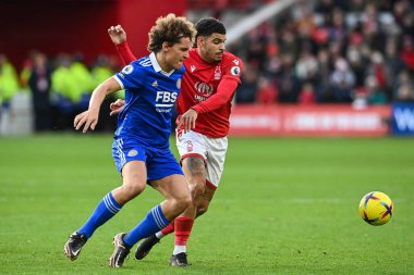 Morgan Gibbs-White #10 of Nottingham Forest  and Wout Faes #3 of Leicester City battle for the ball during the Premier League match Nottingham Forest vs Leicester City at City Ground, Nottingham, United Kingdom, 14th January 202