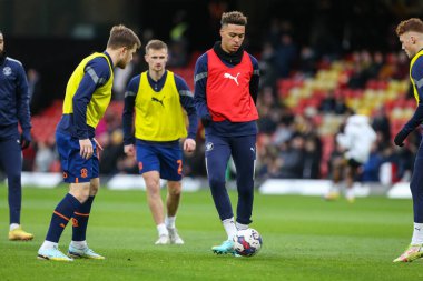 Blackpool players warm up during the Sky Bet Championship match Watford vs Blackpool at Vicarage Road, Watford, United Kingdom, 14th January 202
