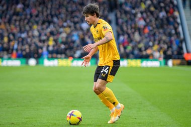Hugo Bueno #64 of Wolverhampton Wanderers with the ball during the Premier League match Wolverhampton Wanderers vs West Ham United at Molineux, Wolverhampton, United Kingdom, 14th January 202