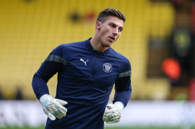 Stuart Moore #13 of Blackpool warms up during the Sky Bet Championship match Watford vs Blackpool at Vicarage Road, Watford, United Kingdom, 14th January 202