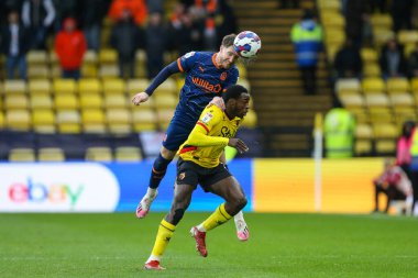 James Husband #3 of Blackpool wins a header against Jeremy Ngakia #2 of Watford during the Sky Bet Championship match Watford vs Blackpool at Vicarage Road, Watford, United Kingdom, 14th January 202