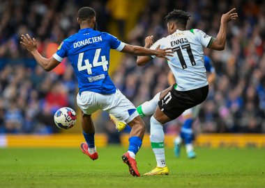 Plymouth Argyle forward Niall Ennis  (11) and Ipswich Town defender Janoi Donacien  (44) battles for the ball  during the Sky Bet League 1 match Ipswich Town vs Plymouth Argyle at Portman Road, Ipswich, United Kingdom, 14th January 202
