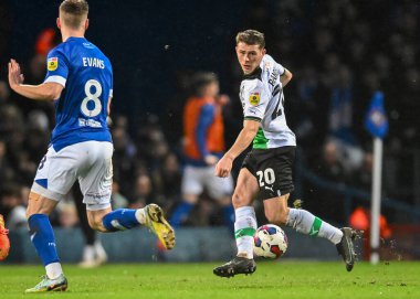 Plymouth Argyle midfielder Adam Randell  (20) passes the ball forward  during the Sky Bet League 1 match Ipswich Town vs Plymouth Argyle at Portman Road, Ipswich, United Kingdom, 14th January 202