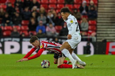 Matthew Sorinola #29 of Swansea City tackles Trai Hume #32 of Sunderland during the Sky Bet Championship match Sunderland vs Swansea City at Stadium Of Light, Sunderland, United Kingdom, 14th January 202