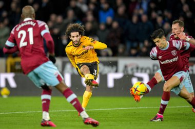 Rayan Ait-Nouri #3 of Wolverhampton Wanderers has a shot during the Premier League match Wolverhampton Wanderers vs West Ham United at Molineux, Wolverhampton, United Kingdom, 14th January 202