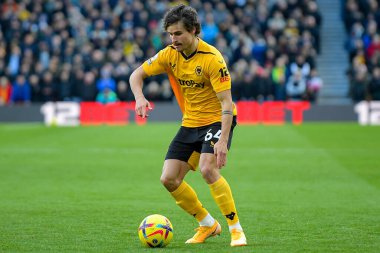 Hugo Bueno #64 of Wolverhampton Wanderers with the ball during the Premier League match Wolverhampton Wanderers vs West Ham United at Molineux, Wolverhampton, United Kingdom, 14th January 202